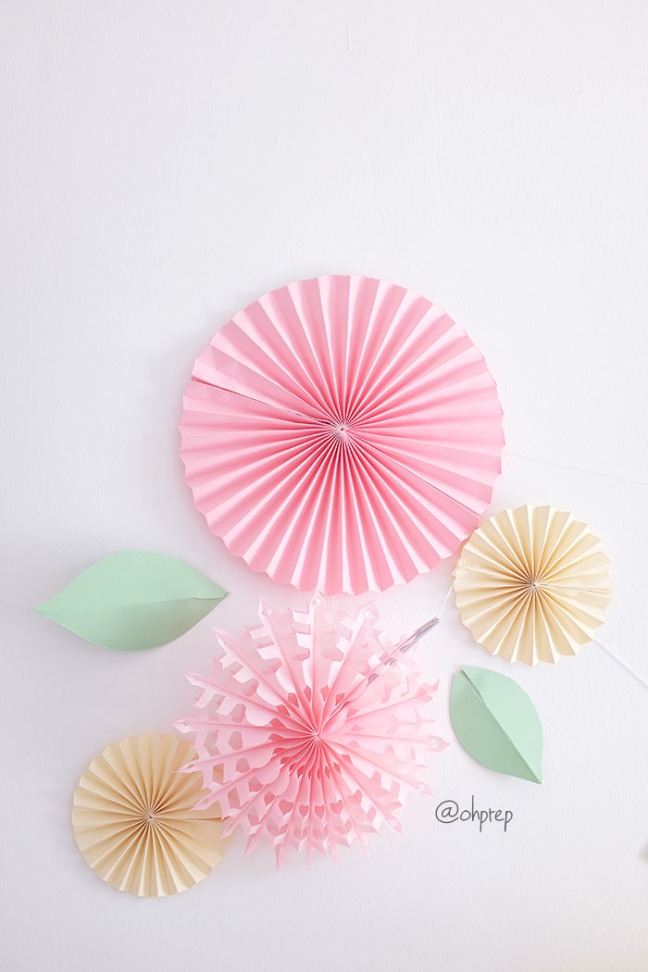 Side Decor using paper fan, snowflakes and paper leaves. 